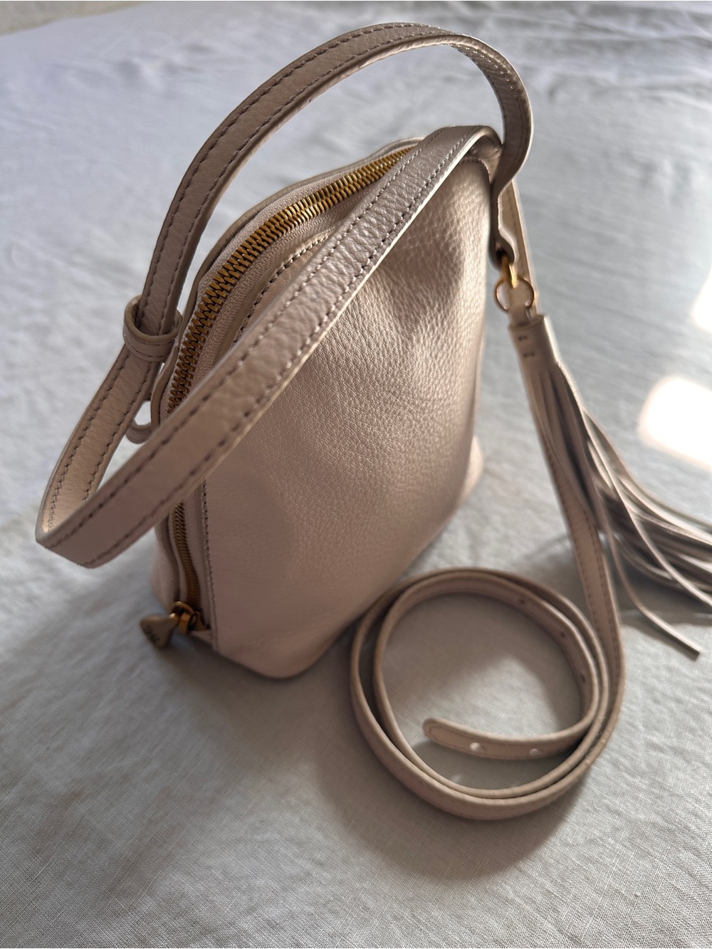 HOBO Ivory Nash Crossbody Bag | Pebbled Leather Tassel Gold Hardware - Picture 15 of 16